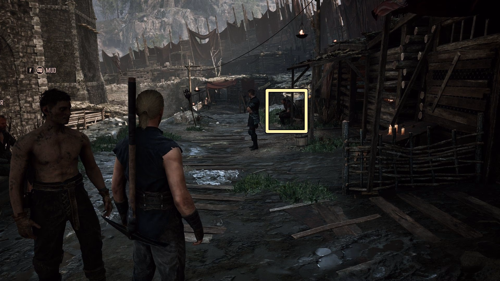 Sly sitting on a bench in the Old Camp in Gothic 1 Remake