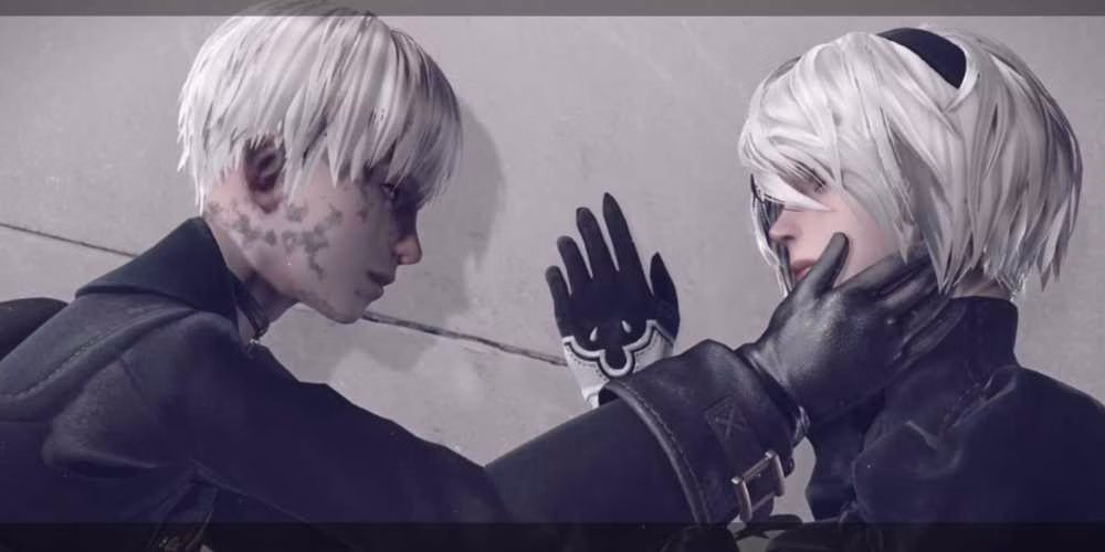 NieR Automata com 9S e 2B sem as m&aacute;scaras